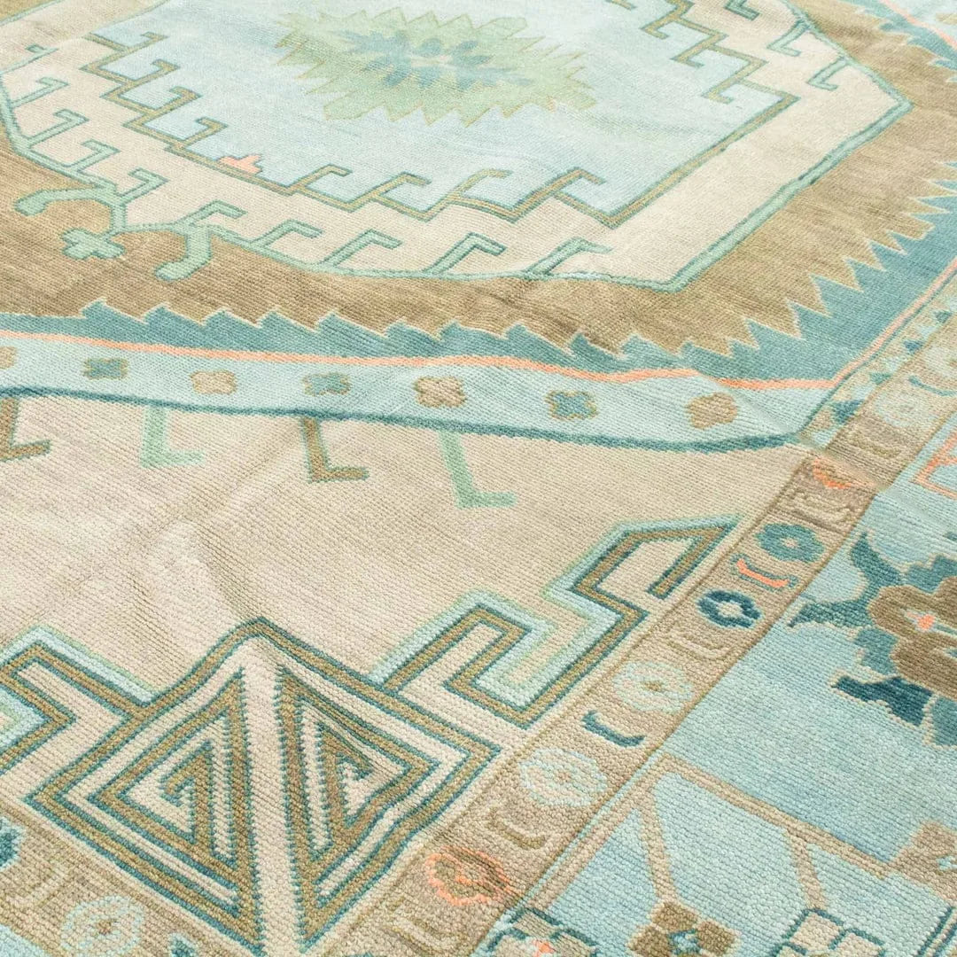 Luxury Oushak-style wool rug in blue, ivory, and beige