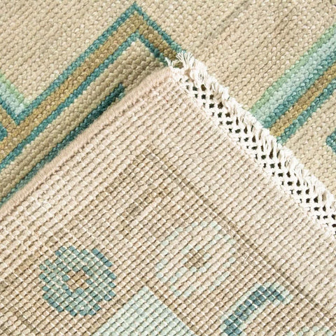 Elegant hand-knotted wool rug with Oushak patterns in light blue