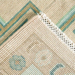 Elegant hand-knotted wool rug with Oushak patterns in light blue
