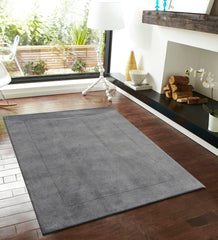 Minimalist modern grey rug with subtle rectangular detailing