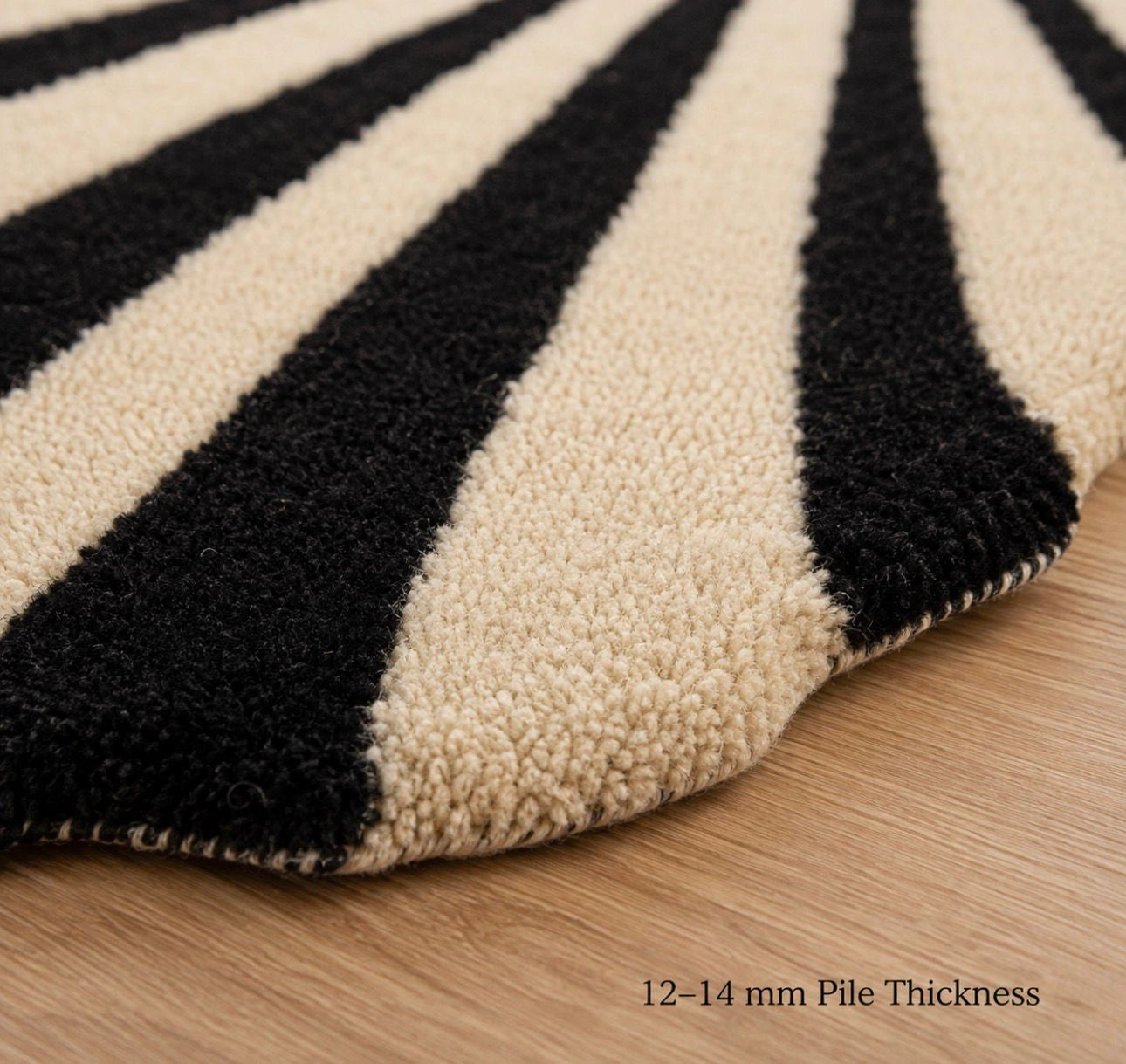 Modern sculptural area rug in black, cream and rust for a contemporary dining room, 6x9