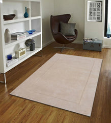 Minimalist neutral wool rug in beige for modern interiors