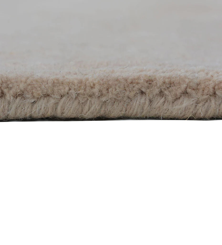 Neutral hand-tufted wool rug for minimalist living rooms