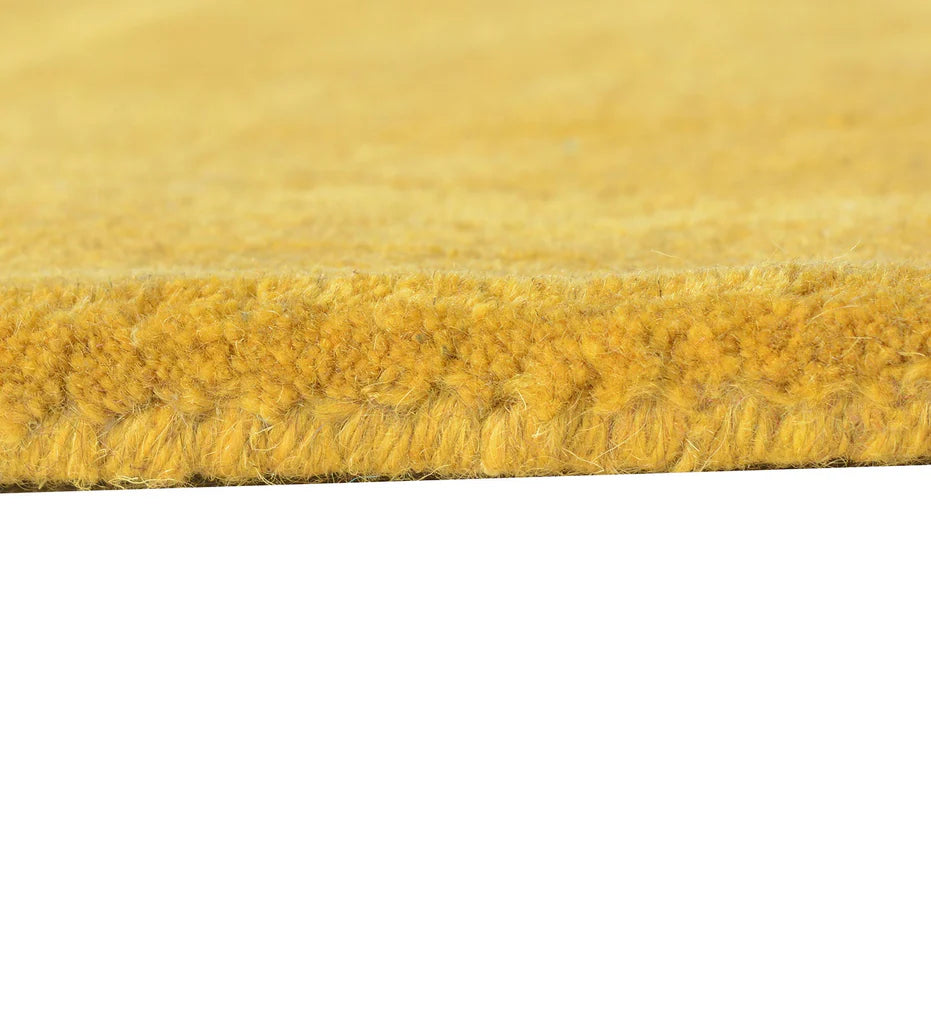 Solid gold hand-tufted rug for living room or bedroom decor