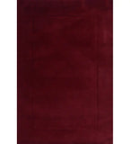 Solid maroon hand-tufted wool rug with minimalist rectangle design