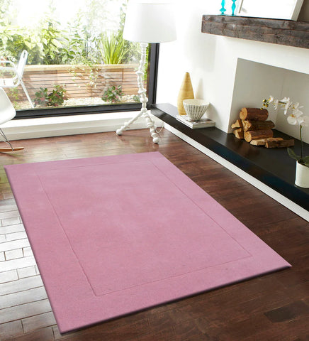 Minimalist pastel pink rug for modern and feminine interiors