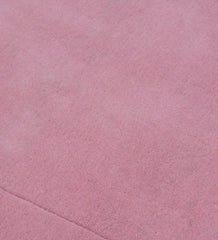 Luxury solid pink wool rug with subtle border detail