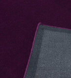 Handcrafted wool rug in royal purple minimalist style