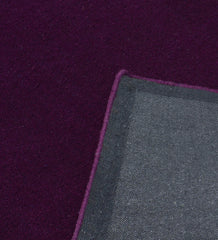 Handcrafted wool rug in royal purple minimalist style