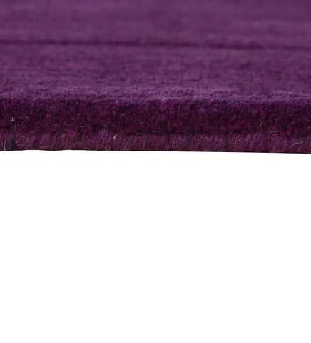 Modern solid plum rug with embossed rectangle detailing