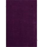 Solid purple hand-tufted wool rug with embossed rectangle