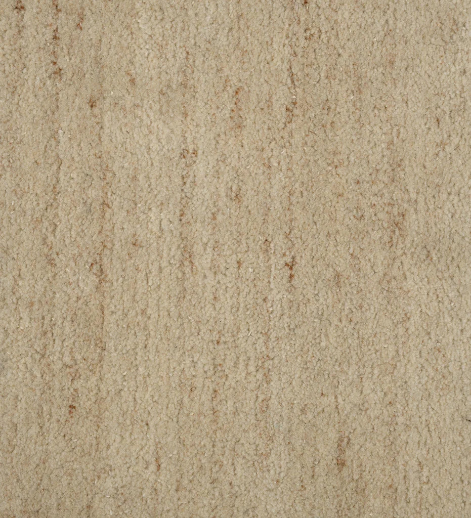 Minimalist hand-tufted wool rug in neutral tones