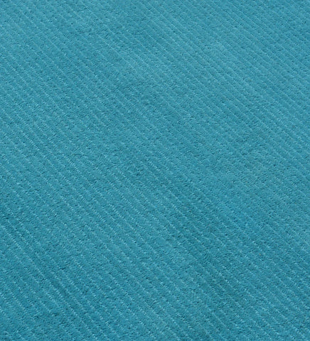 Luxury teal wool rug with contemporary textured finish