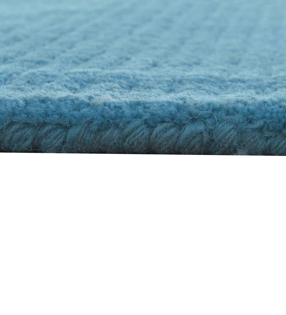 Premium teal hand-tufted wool rug with textured design