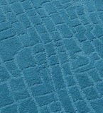 Luxury minimalist teal hand-tufted rug with texture