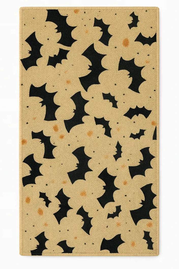 Halloween rug with black bats flying across beige background.