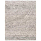 Stone Drift hand-tufted wool rug in neutral beige with flowing wave pattern, luxury home decor