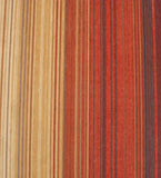 Handwoven luxury rug with warm sunset horizon stripes in red, orange, beige, and blue tones