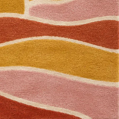 A square area rug featuring a retro sunset and wave design in warm colors including orange, yellow, pink, cream, and dark purple.