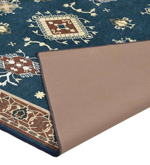 Machine washable rug in teal rustic design.