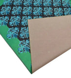 Teal damask style rug with floral patterns and green border, showcasing handwoven luxury craftsmanship