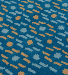 Luxury teal rug with white and yellow geometric dot pattern