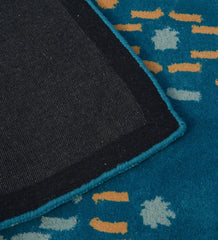 Hand-tufted contemporary rug with dotted abstract cascade design