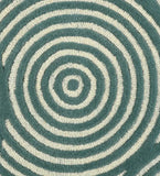 Luxury wool rug featuring bold concentric circle design