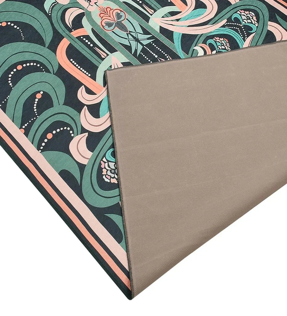 Stylish teal and peach abstract rug perfect for high-traffic areas.