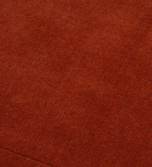 Luxury solid terracotta orange rug for modern interiors