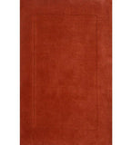 Solid terracotta orange hand-tufted wool rug with embossed rectangle