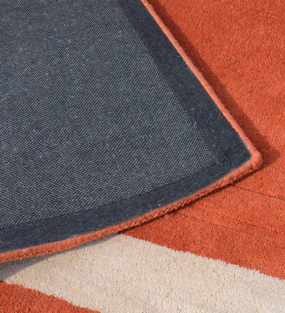 Contemporary terracotta rug with embossed rectangle detail