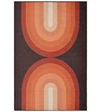Terracotta retro geometric arch rug with warm gradient tones on dark background