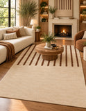Terracotta and cream geometric area rug styled in a modern living room, 9x12 size
