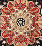 Luxury wool rug featuring red, black, and beige design