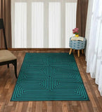 Modern turquoise maze patterned rug on wooden floor with chair and patterned ottoman