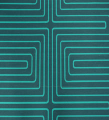 Low-profile turquoise rug with white maze design.