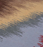 Close-up of modern abstract wave rug with beige, brown, gray, and red textured pattern