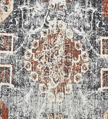 Low-profile rug with beige, red, and blue faded patterns.