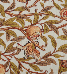 Low-profile beige rug with terracotta and green botanical designs.