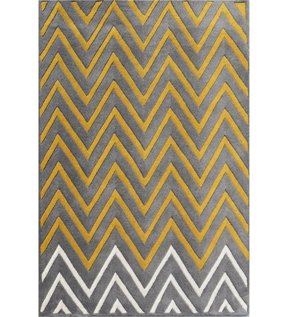 Modern chevron rug in gray, mustard yellow, and white.