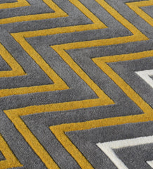 Contemporary chevron design rug with bold stripes.