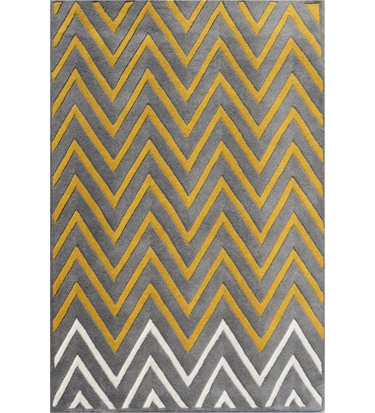 Modern chevron rug in gray, mustard yellow, and white.