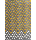 Luxury handwoven rug with yellow and white chevron patterns on gray background, modern home decor