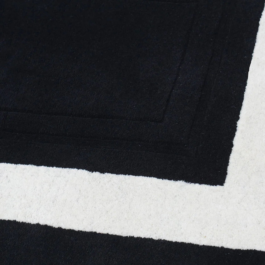 black rug border wool 