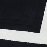black rug border wool 