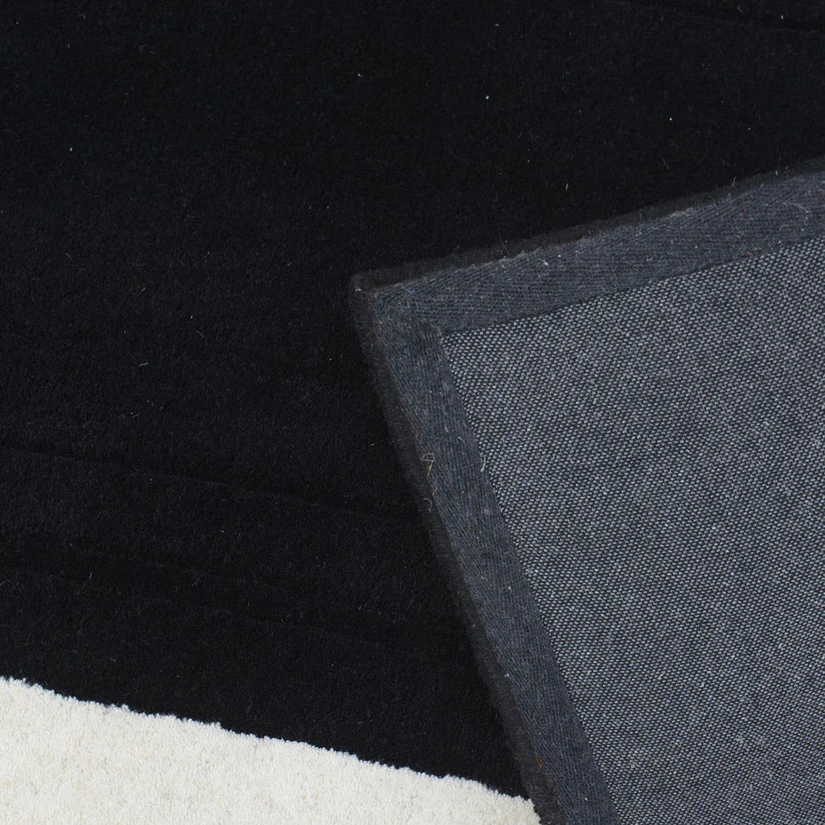 black rug border wool