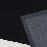 black rug border wool