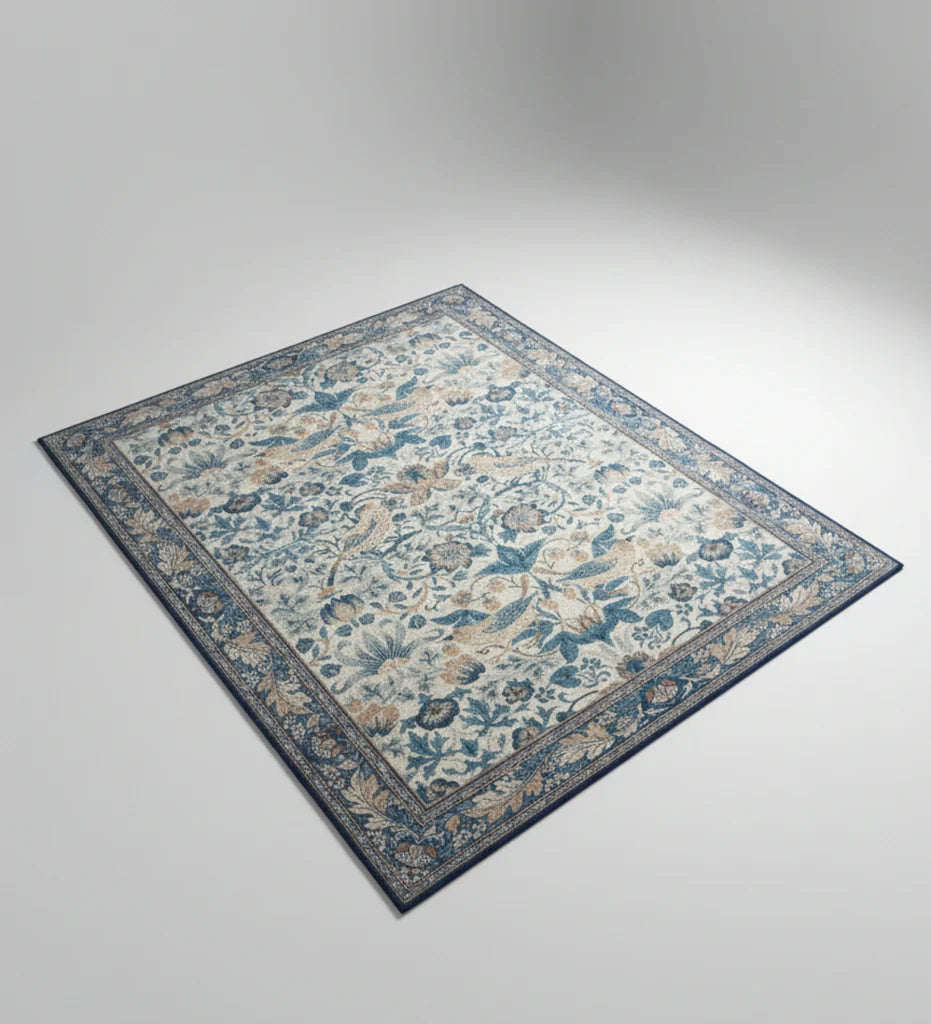 Floral patterned rug on a plain background