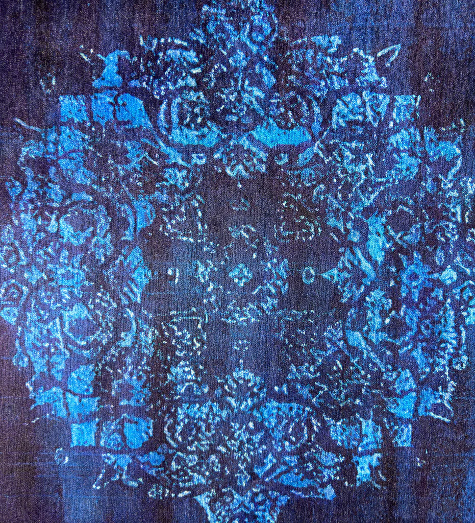 Blue floral pattern on a dark fabric background